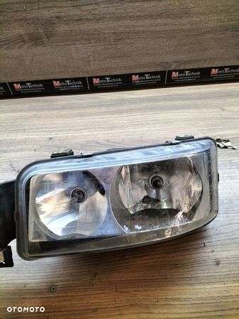 REFLEKTOR LAMPA PRZEDNIA MAN TGA/TGL/TGM LEWY - 1