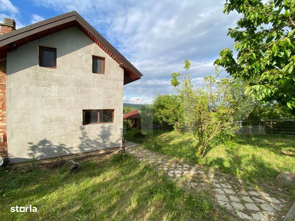 Casuta cocheta cu panorama superba asupra satului Campenesti si a lacu - Imagine principală: 1/9