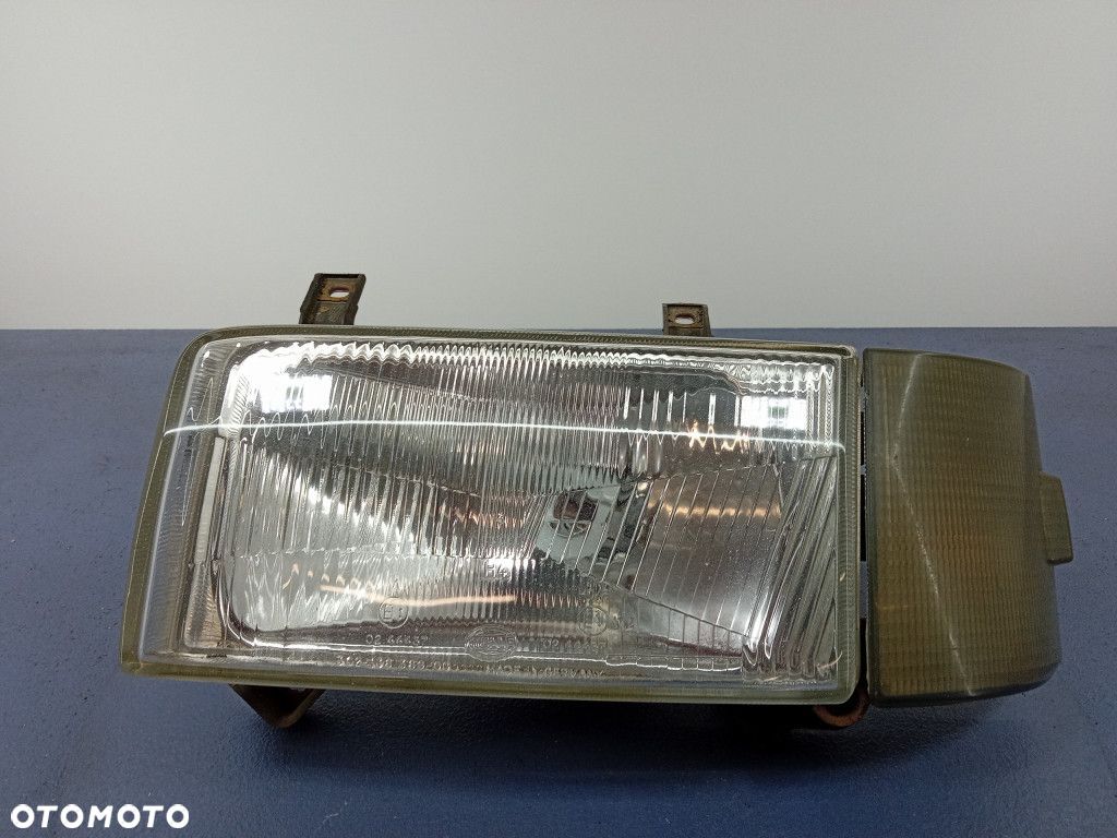 VW T4 REFLEKTOR LEWY LAMPA EU 302-136 369-00 - 1