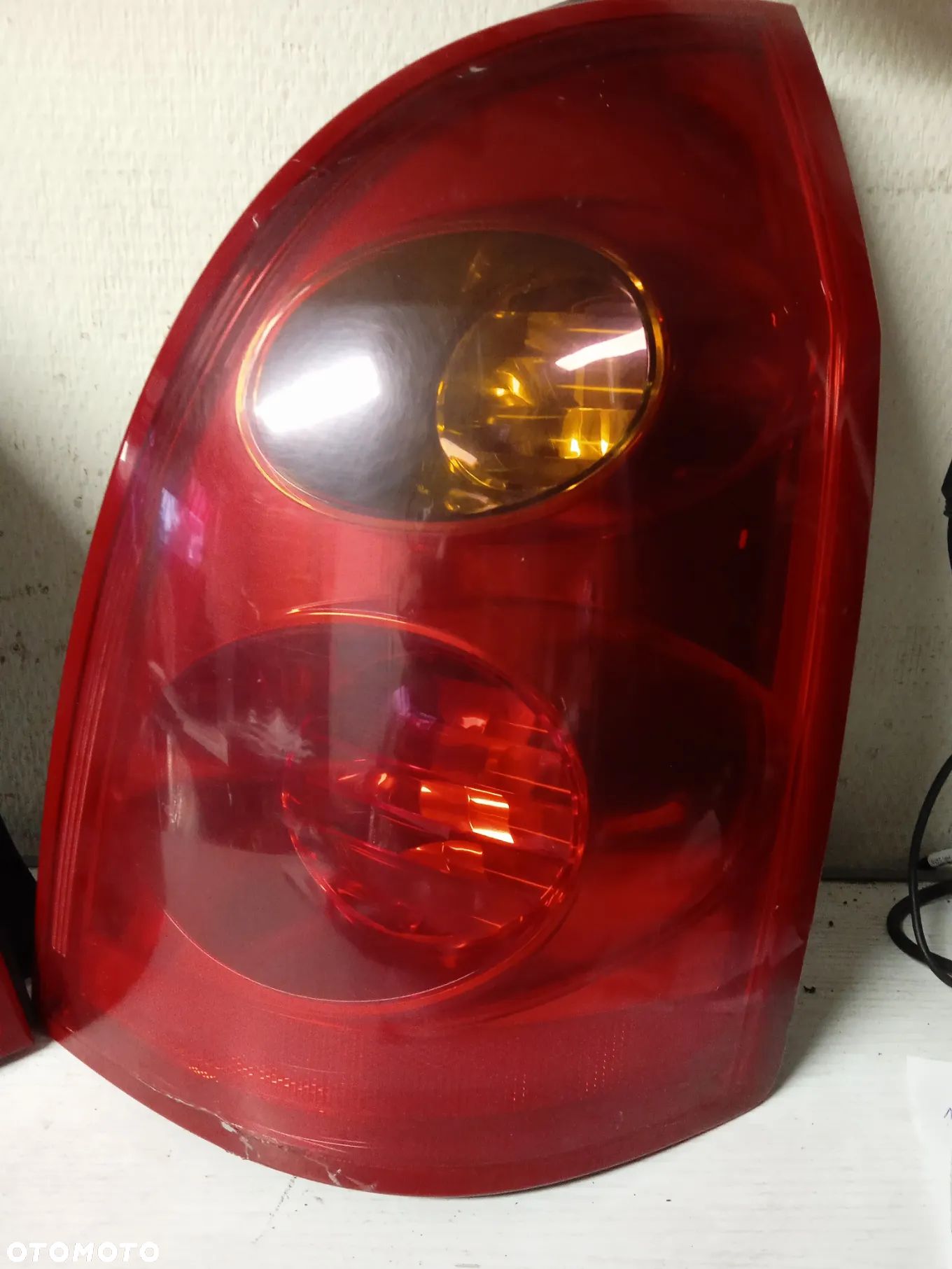 LAMPA TYLNA NISSAN PRIMERA P12 KOMBI PRAWA - 1