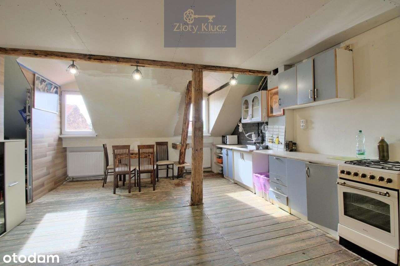 Przestronne 3 pokoje w samym Rynku ogrz. gazowe-0