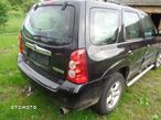 FORD MAVERICK ESCAPE 2,0 2,3 3,0 ZWROTNICA LEWA PRAWA  ZACISK TARCZ ABS czesci oryginal - 11