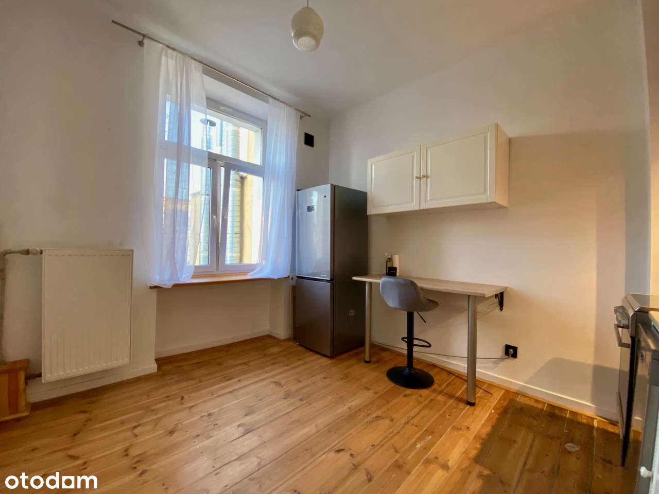 Przestronna kawalerka z oddzielną kuchnią w przedwojennej kamienicy - Pełny obrazek: 5/9