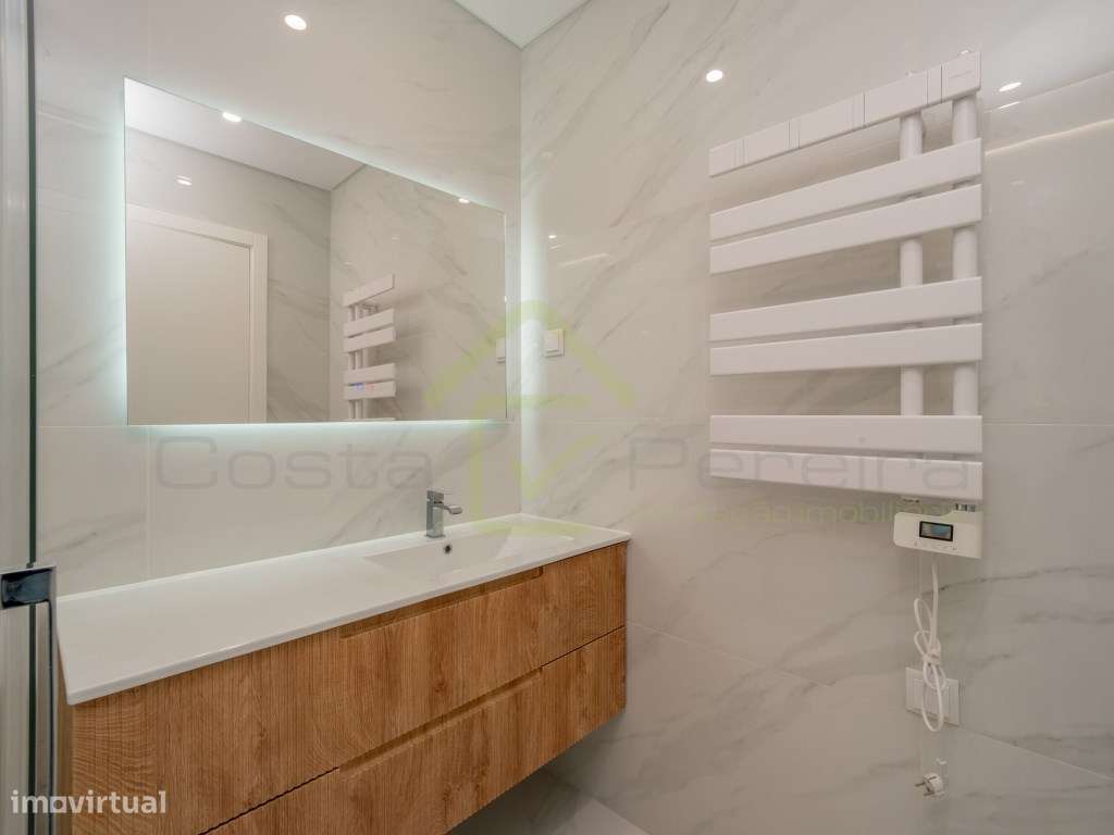 Apartamento T2 como Novo, à entrada de Lisboa.-17