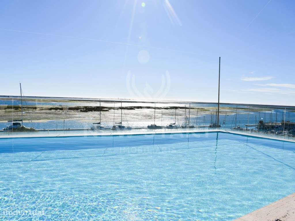 Apartamento T2 novo, garagem, piscinas, vista mar, Del Mar em Olhão-24