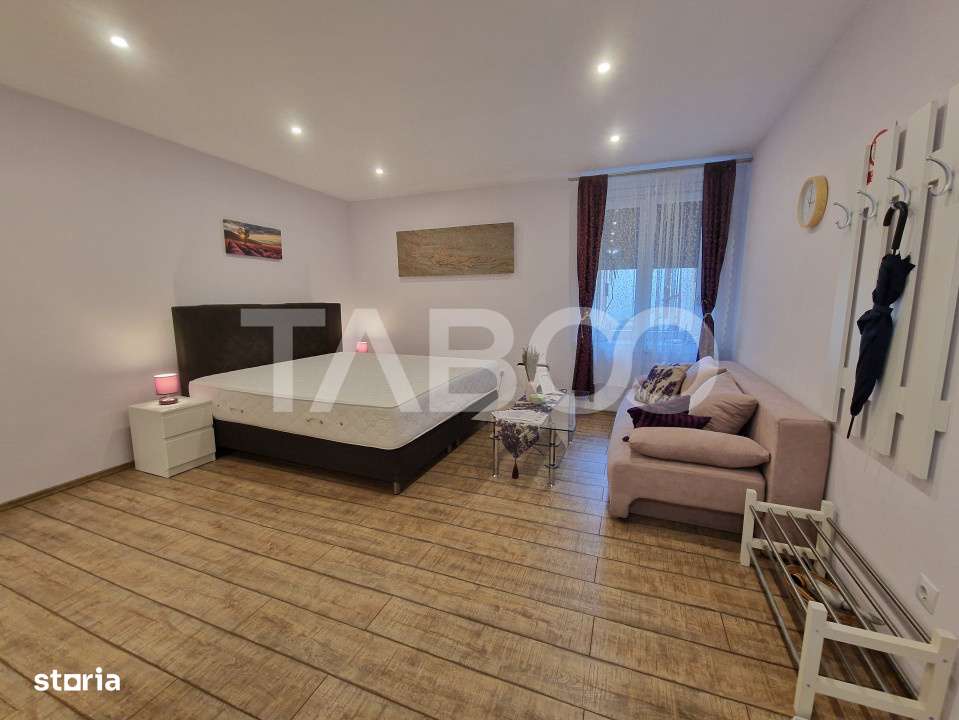 Garsoniera moderna 32mpu de inchiriat in centrul Sibiului - Imagine principală: 1/10