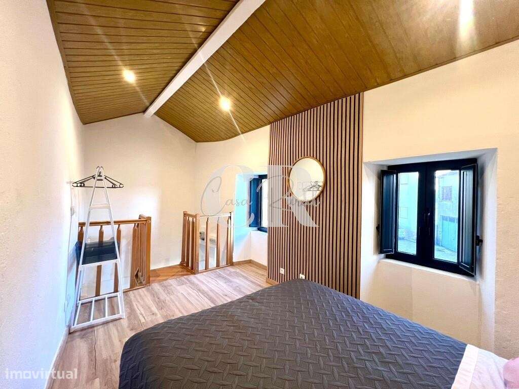 Moradia acolhedora no centro histórico com potencial de investimento-21