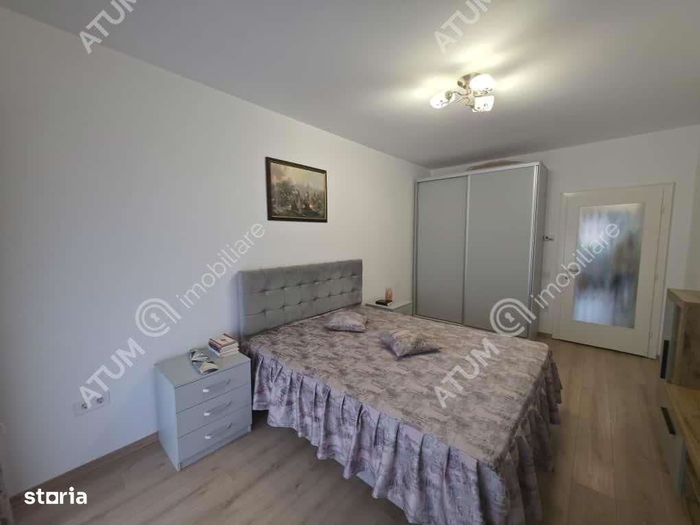 Garsoniera decomandata cu balcon si parcare in zona DaVinci din Sibiu-2
