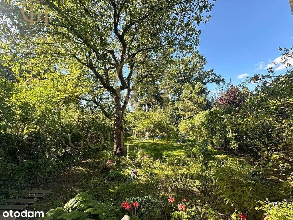 Wyjątkowy dom z pięknym ogrodem-10