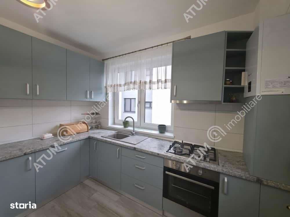 Garsoniera decomandata cu balcon si parcare in zona DaVinci din Sibiu-8