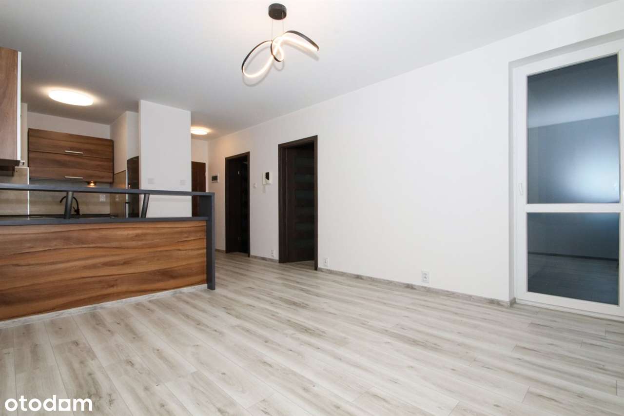 2 pokoje, parter, duży balkon, os. Hubalczyków, blok z 2011 roku-1