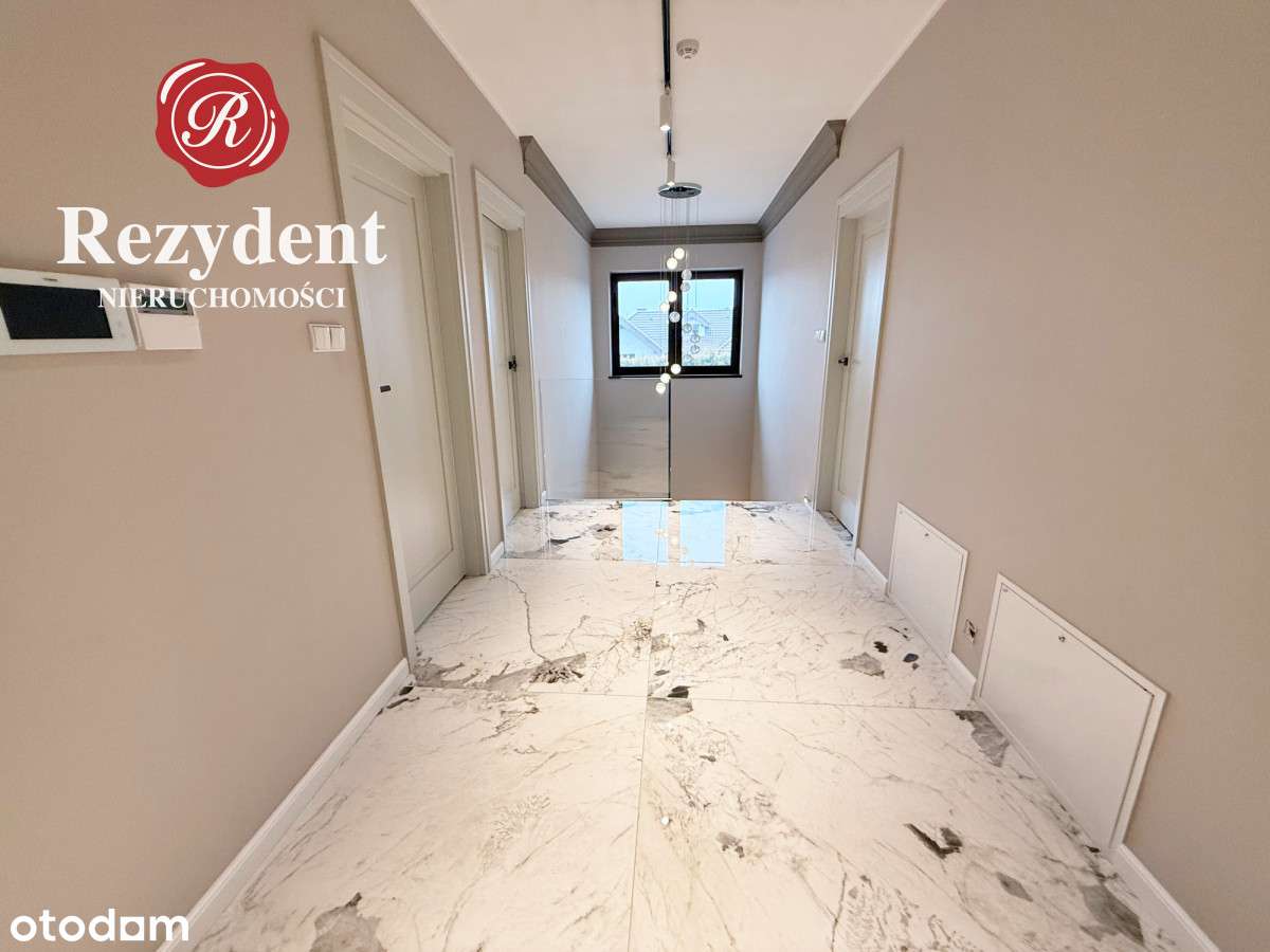 Nowoczesny, przestronny dom w spokojnym otoczeniu-12