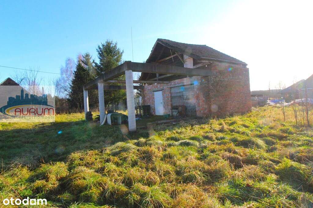 Rozpoczęta budowa, sklep, budynek gospodarczy.-6