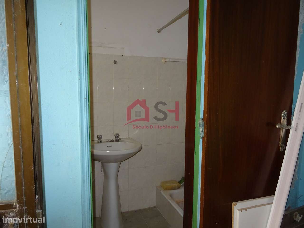 *Prédio com 2 Apartamentos + Loja + Arrecadação – Santa Cruz*-12