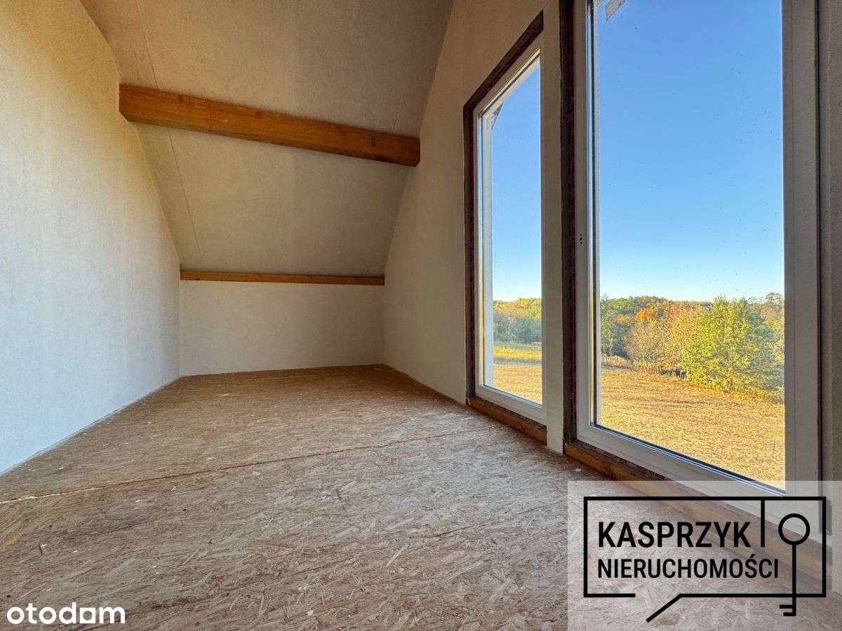 Duża działka z domem niskoenergetycznym.-6