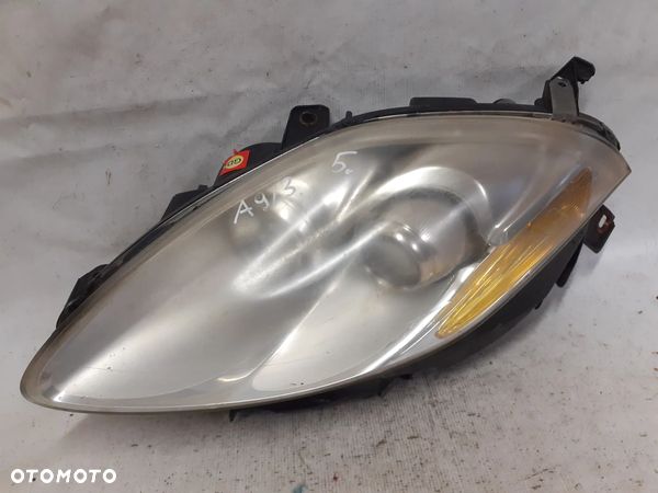 .  PRZOD PRZEDNIA LAMPA  LEWA FIAT BRAVO II - 1