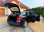 Opel Astra IV 1.4 T Cosmo - 30