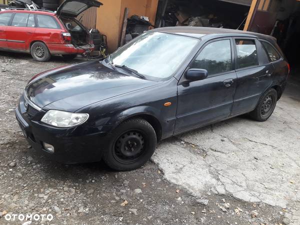 Mazda 323 323f BJ 98-03 Lift  Maska lampa zderzak pas atrapa 22V - 4