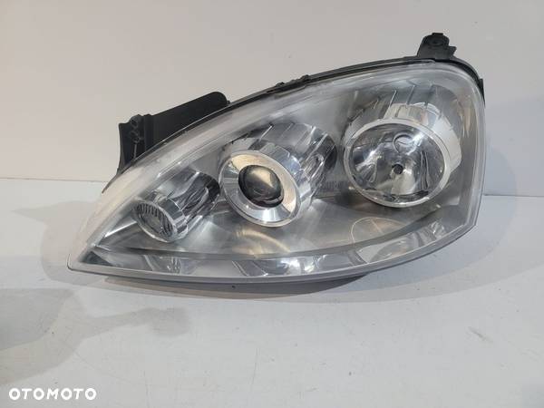 Opel Corsa / Combo C lampa przednia H7 L - 13671 - 1