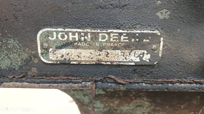 John Deere 710 - 4