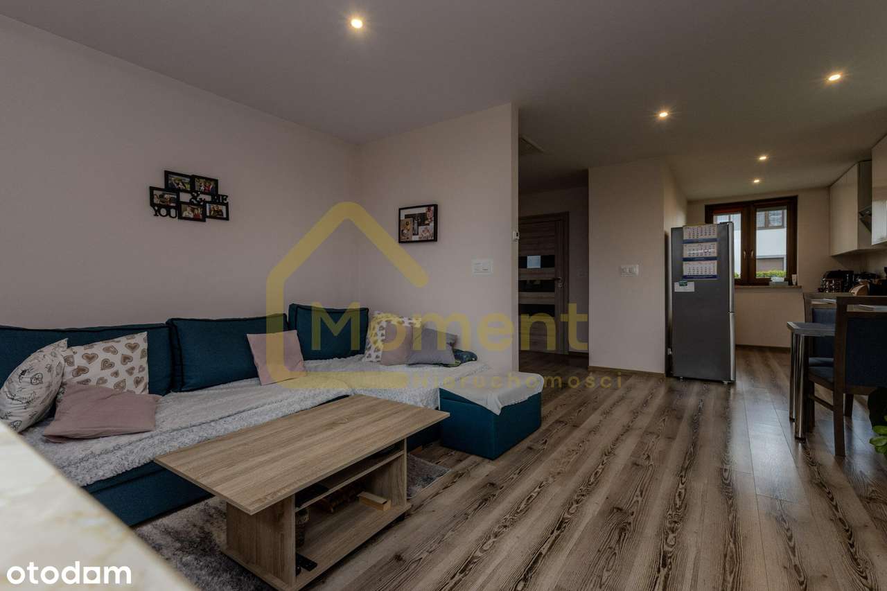 Ekonomiczny dom z garażem i pięknym ogrodem-7