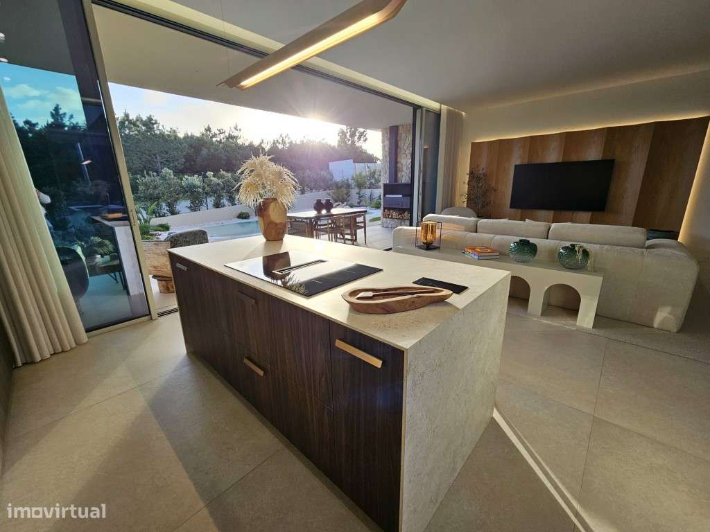 Moradia de extraordinária qualidade junto à lagoa, golfe e praia-6