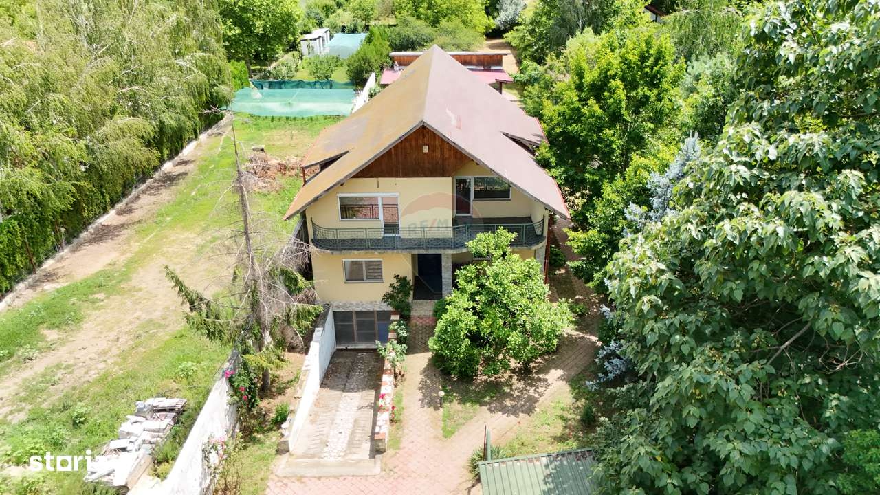 Vila de vânzare Snagov | Piscină, Livadă, 8 camere | 3077 mp teren - Imagine principală: 4/20
