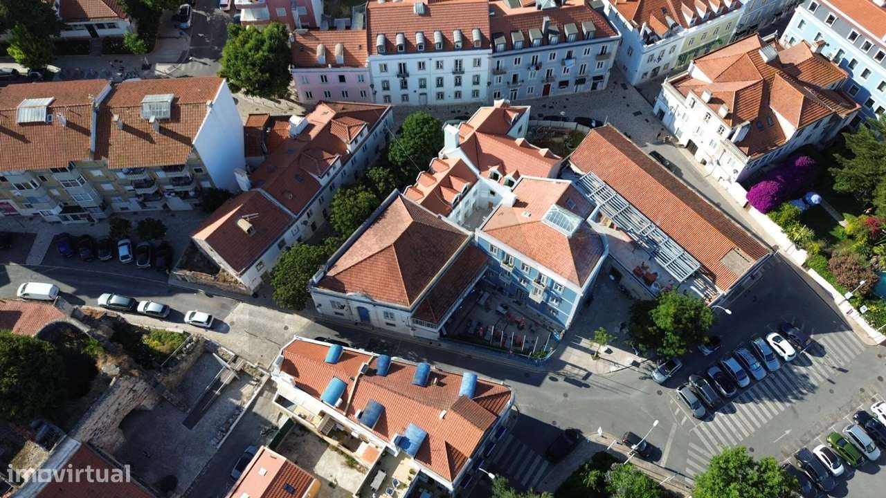 Oportunidade Única: Edifício Secular com Terreno de 426 m2 | História - Grande imagem: 5/15