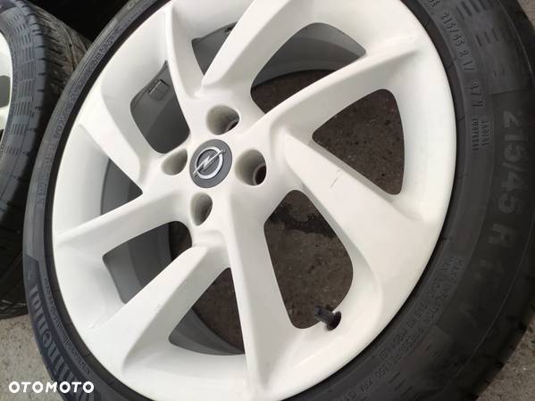 4x100 Felgi Aluminiowe Alufelgi 17 Koła Letnie Lato OPEL CORSA D E ADAM ASTRA G H FIAT GRANDE PUNTO Punto Evo Białe Legnica ALU-RAD 215/45 - 6