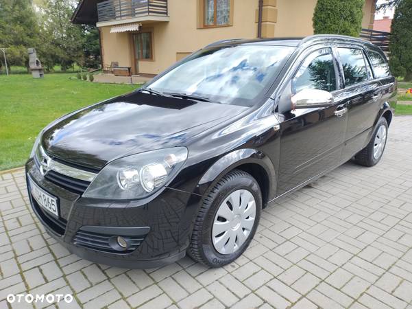 Opel Astra 1.8 Caravan Edition - 14