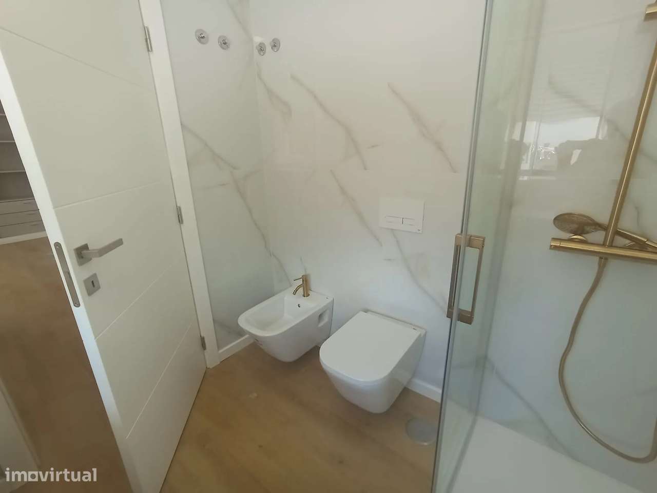 Moradia geminada no centro da Costa da Caparica-16