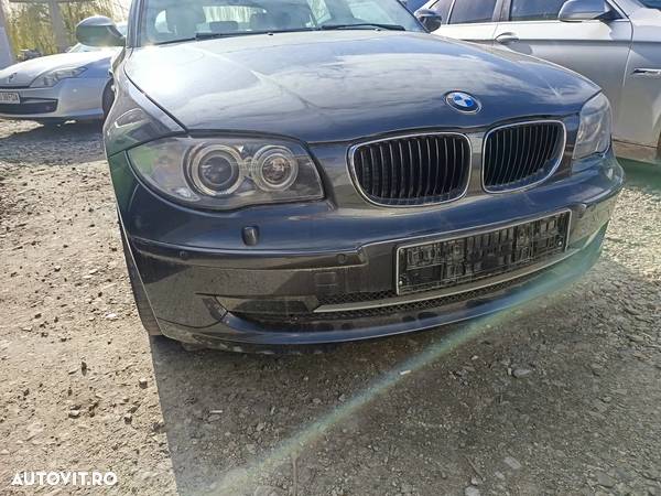 Bara fata cu loc pentru senzori si spalatoare faruri BMW Seria 1 Hatchback 118D 2.0 D 2007 - 1