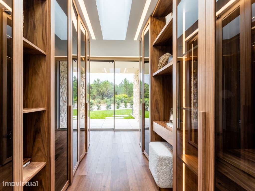 Moradia de extraordinária qualidade junto à lagoa, golfe e praia-21