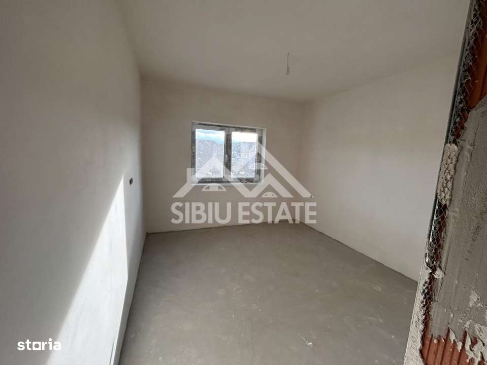 Apartament modern decomandat cu 2 camere si balcon in Șelimbar - Imagine principală: 4/6