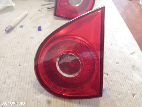 stop tripla lampa stanga spate parte haion vw golf 5 originala perfect funcționala - 1