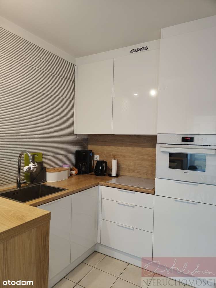 Z dużym balkonem i garażem w super lokalizacji-3