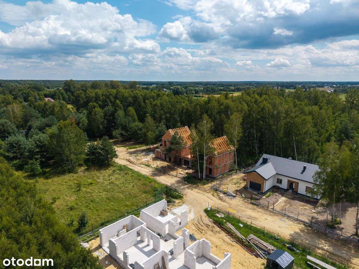 Dom z ogrodem pod Warszawą – nowoczesna inwestycja-11