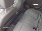 Opel Astra IV 1.4 T Cosmo - 17