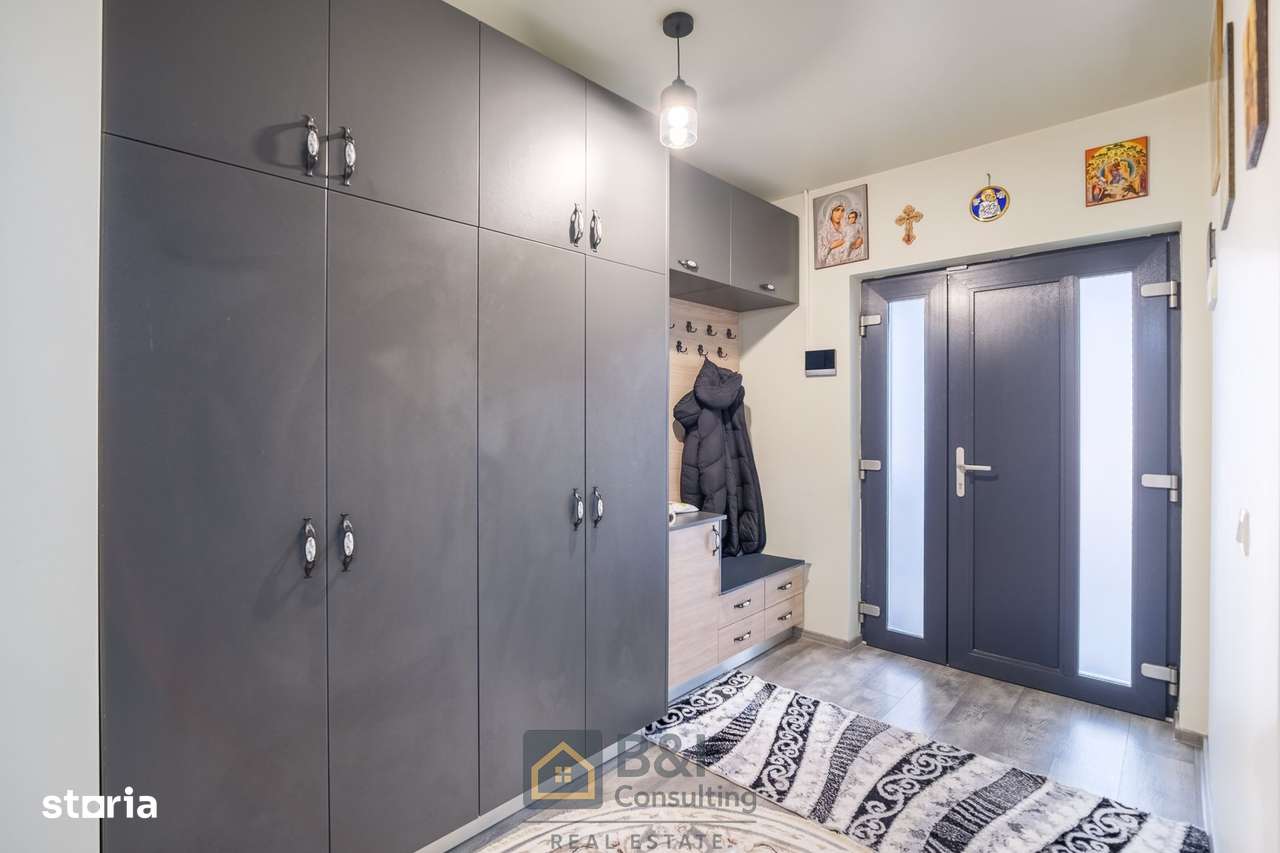 O casă construită responsabil, cu garaj si terasa imensa in Tomesti-12