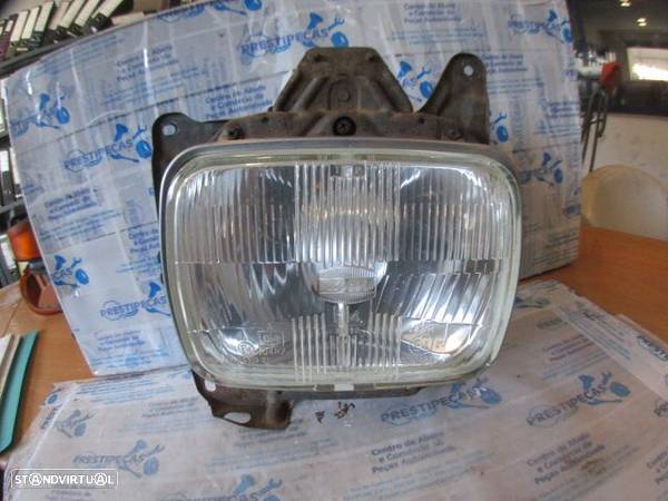 Farol Far1541 NISSAN PICK UP 2 KING CAB D21  1993 2.5D 4X4 75CV 2P PRETA DRT H4 KOITO - 1