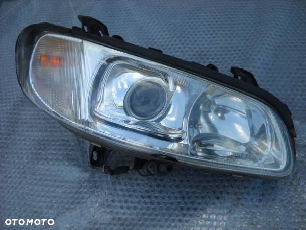 REFLEKTOR LAMPA OPEL OMEGA XENON KOMPLETNY OMEGA B - 1