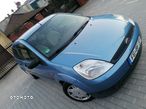 Ford Fiesta 1.4 Ghia - 31