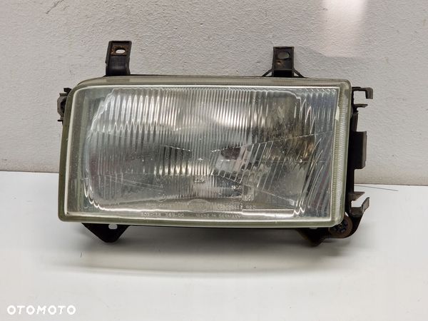 VW T4 91-03 LAMPA LEWA PRZÓD REFLEKTOR HELLA - 1