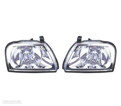 FARÓIS OPTICAS COM REGULAÇÃO ELÉCTRICA PARA MITSUBISHI L200 K74 96-06 - 1