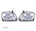 FARÓIS OPTICAS COM REGULAÇÃO ELÉCTRICA PARA MITSUBISHI L200 K74 96-06 - 1