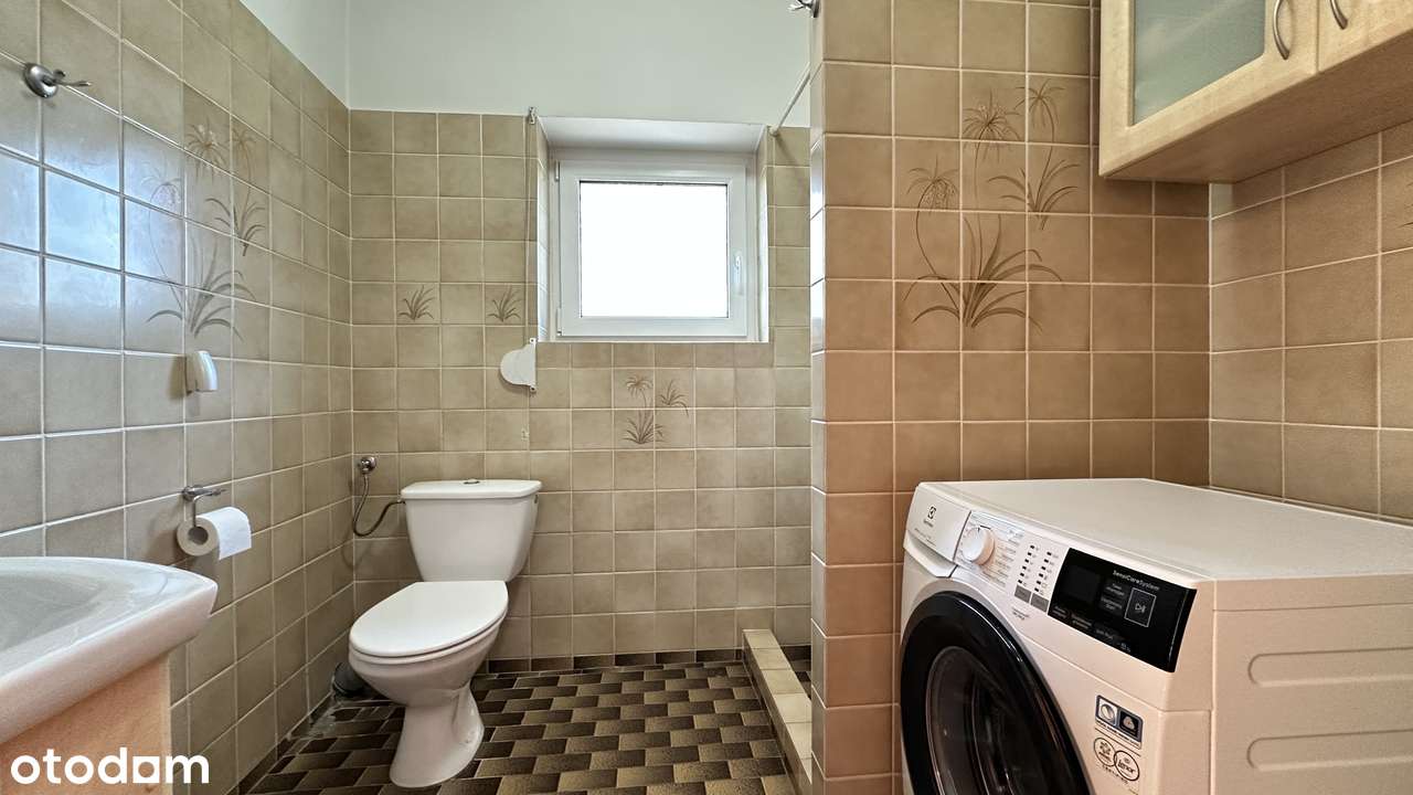 Pół bliźniaka 108 m kw z tarasem, pięknym ogrodem, piwnicą i garażem.-7