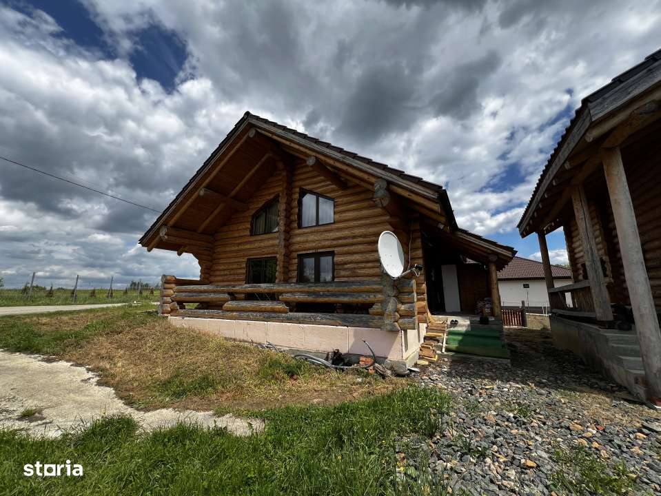 Doua cabane din bustean rotund, 120mp, 1200mp teren, zona Balcesti - Imagine principală: 2/15