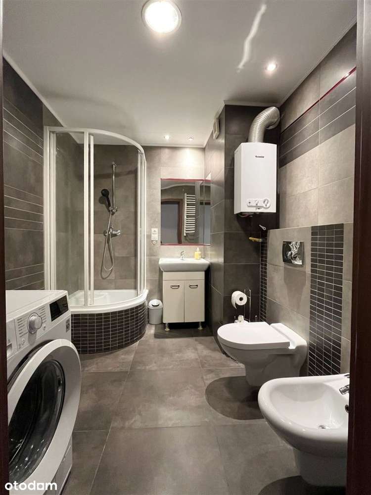 Mdm - dwa poziomy, garaż, ogródek, duży balkon-0