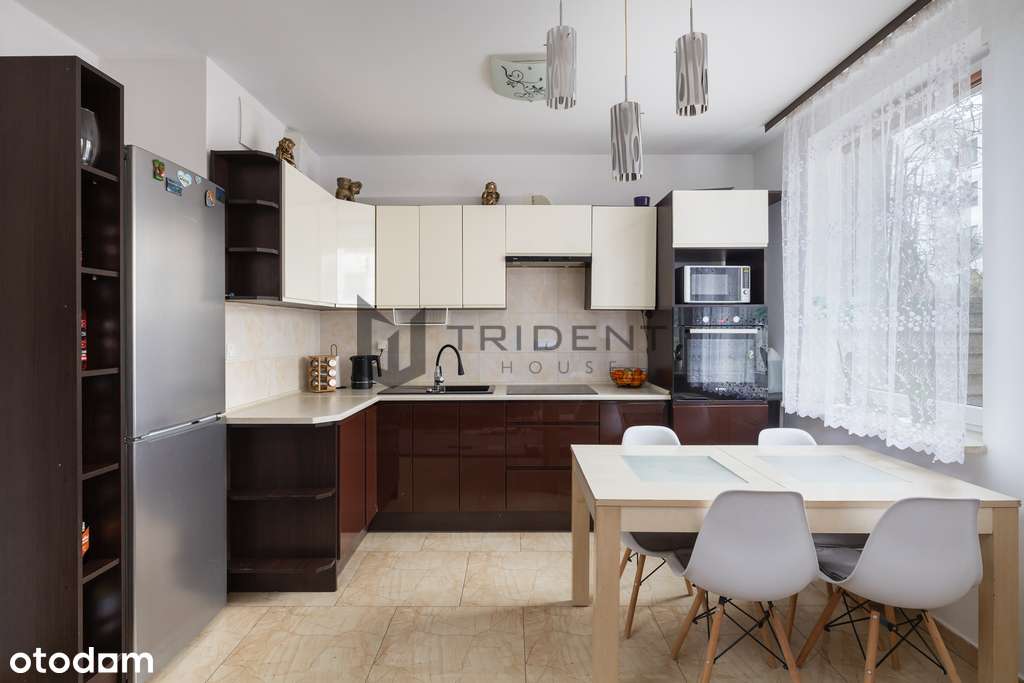 Wykończone mieszkanie z ogródkiem i garażem!-0