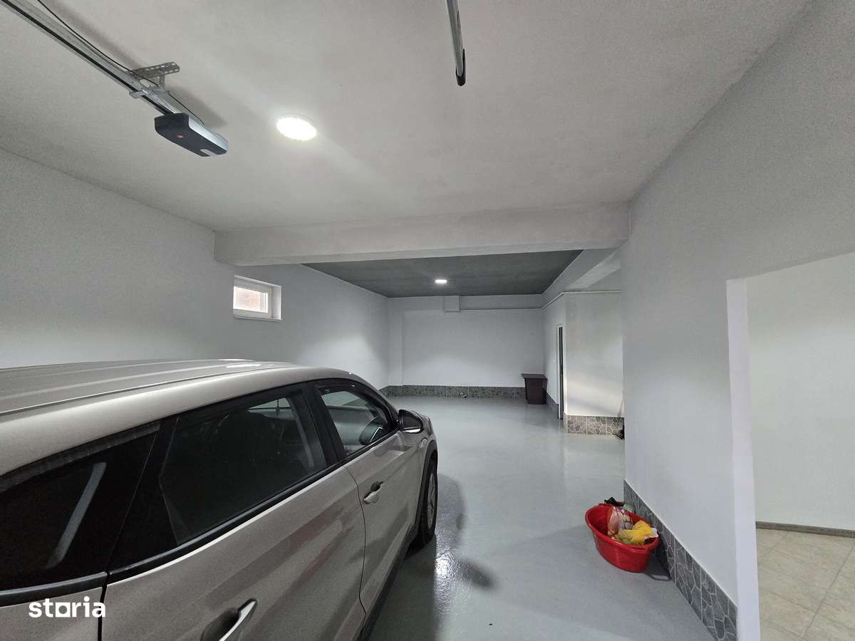 CASA MODERNA 4 camere 2 bai 210 mp Garaj Teren 1050 mp CIURBESTI-16